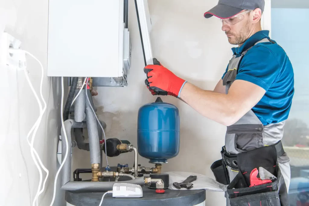 Plumber performs gas fitting services
